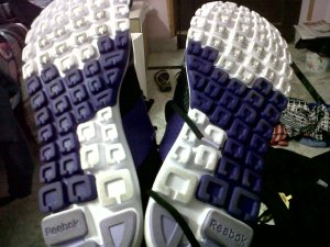 Reebok RealFlex.... i ran ADHM last year in this... sticking with it again...